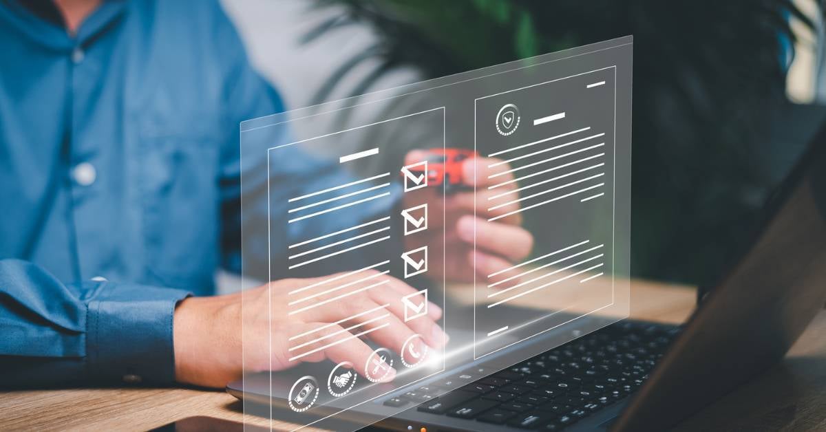 A-closeup-on-a-male-employees-hands-typing-with-a-digitized-depiction-of-a-checklist