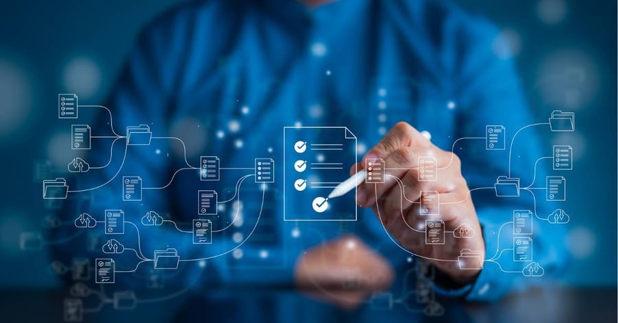 A-closeup-on-an-executives-hands-as-they-look-through-workflows