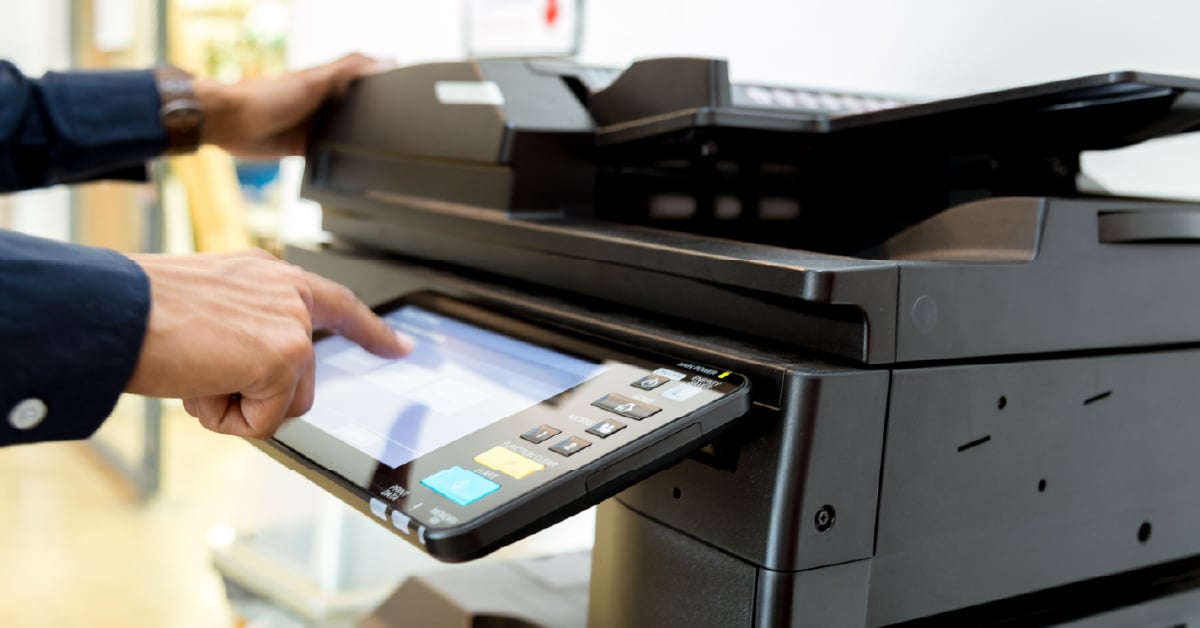 Employee using work printer.