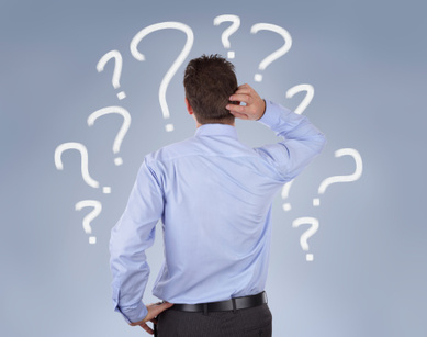 Image description: Man in blue shirt against blue background. He is scratching the back of his head/neck and is depicted surrounded by numerous white question marks. 